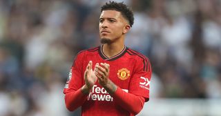Manchester United star Jadon Sancho applauds the fans at the final whistle during the Premier League match between Tottenham Hotspur and Manchester United at Tottenham Hotspur Stadium on August 19, 2023 in London, England.