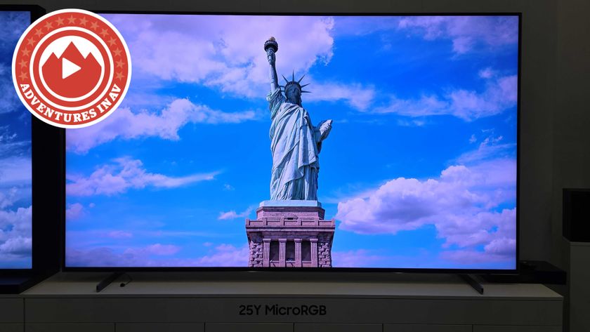 The Statue of Liberty on a 115-inch Samsung TV with the Adventures in AV logo on the left.