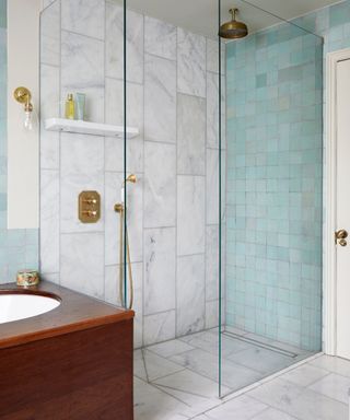 Marble shower with glass frameless doors