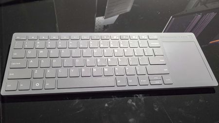 The Framework Wireless Touchpad Keyboard on a table