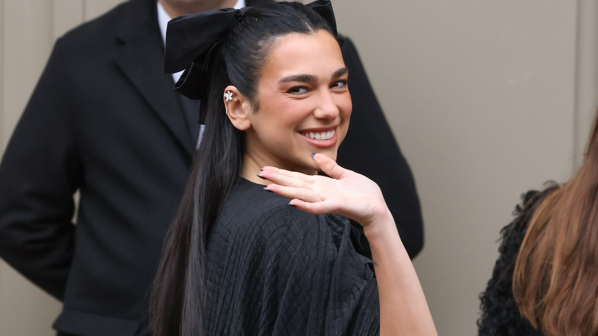 Dua Lipa posted her new Chanel Spring 2026 bag on Instagram, alongside the military jacket trend 