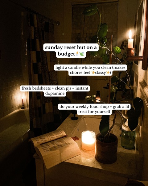 a candle lit bathroom with information on how to have a 'Sunday reset but on a budget' 