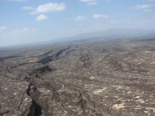 Fractures along the Afar Rift in Ethiopia resemble those at a mid-ocean ridge, where two pieces of oceanic crust spread apart.
