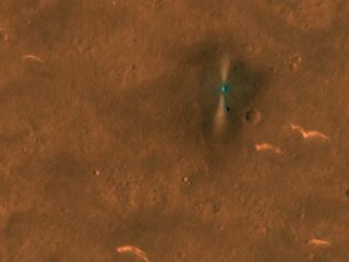 The HiRISE camera on NASA's Mars Reconnaissance Orbiter captured this photo of China's Mars rover Zhurong (lower bright spot) and its lander on June 6, 2021.