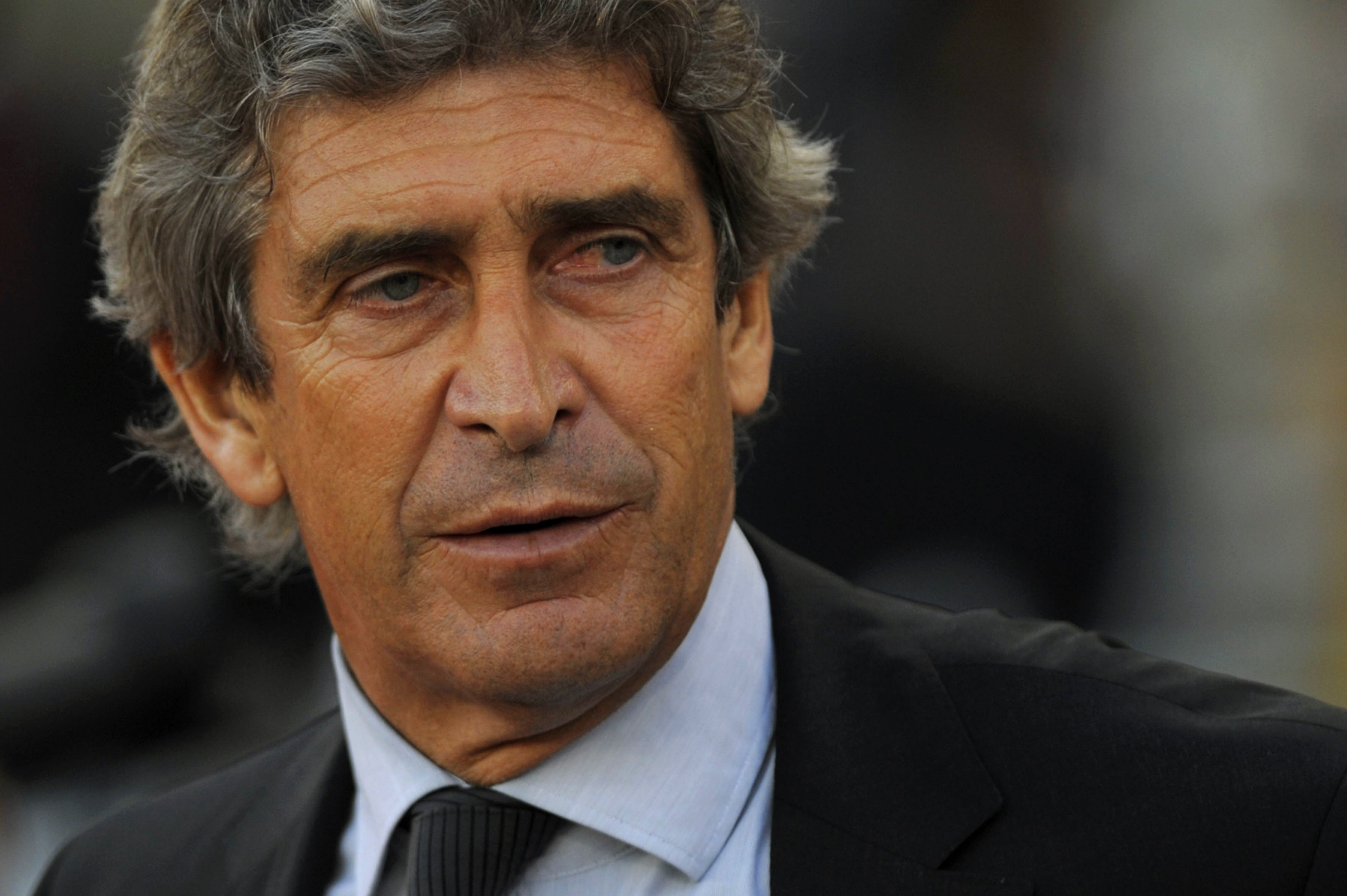 Real Madrid coach Manuel Pellegrini looks on during a match against Almeria in April 2010.