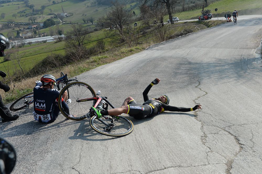 A Colombia rider is involved in a crash.