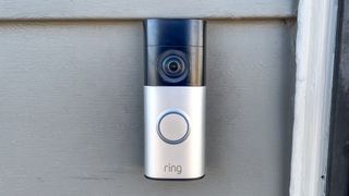 Ring Wired Doorbell Plus (2nd gen) mounted next to a front door