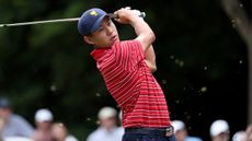 Collin Morikawa takes a shot in the 2022 Presidents Cup