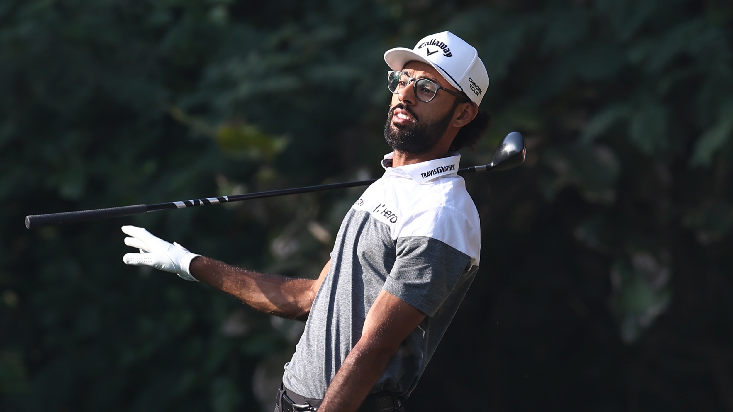 Akshay Bhatia looks on after playing a shot at the 2026 Hero Indian Open on the DP World Tour