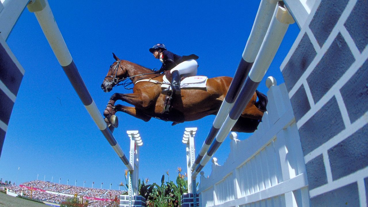 19 Sep 2000: Pippa Funnell of Great Britain and Supreme Rock on their way to Silver during the Three Day Event Show Jumping section at the Sydney International Equestrian Centre on Day Four of the Sydney 2000 Olympic Games in Sydney, Australia. Mandatory Credit: Al Bello /Allsport