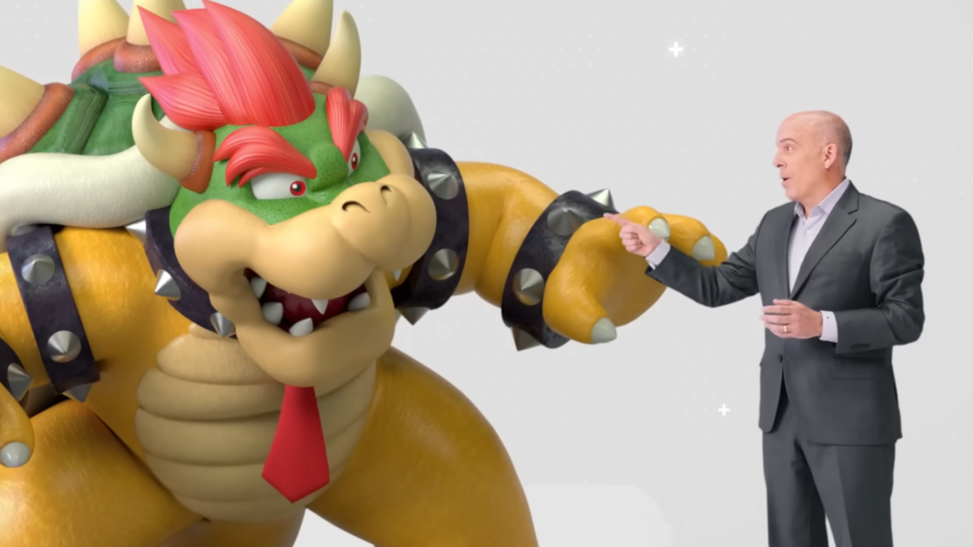 Former Nintendo of America president Doug Bowser with the Mario villain that shares his name