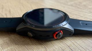 A photo of the button case on the Garmin Fenix 7