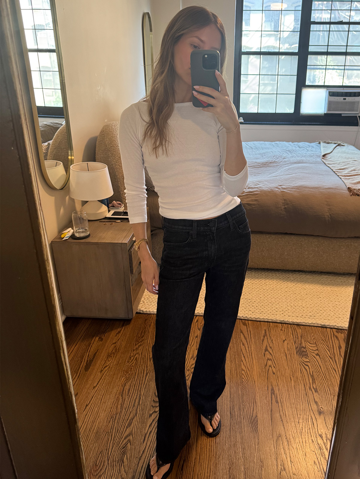 Nikki wears a white tee and Mother Reifler jeans.