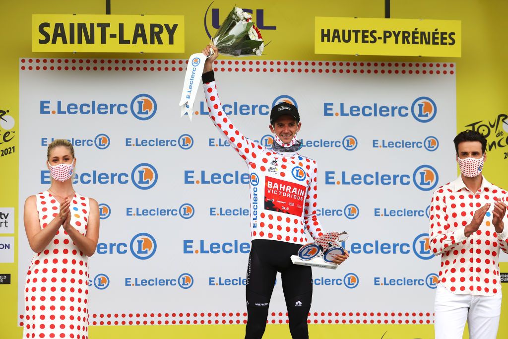SAINTLARYSOULAN COL DU PORTET FRANCE JULY 14 Wout Poels of The Netherlands and Team Bahrain Victorious Polka Dot Mountain Jersey celebrates at podium during the 108th Tour de France 2021 Stage 17 a 1784km stage from Muret to SaintLarySoulan Col du Portet 2215m LeTour TDF2021 on July 14 2021 in SaintLarySoulan Col du Portet France Photo by Michael SteeleGetty Images