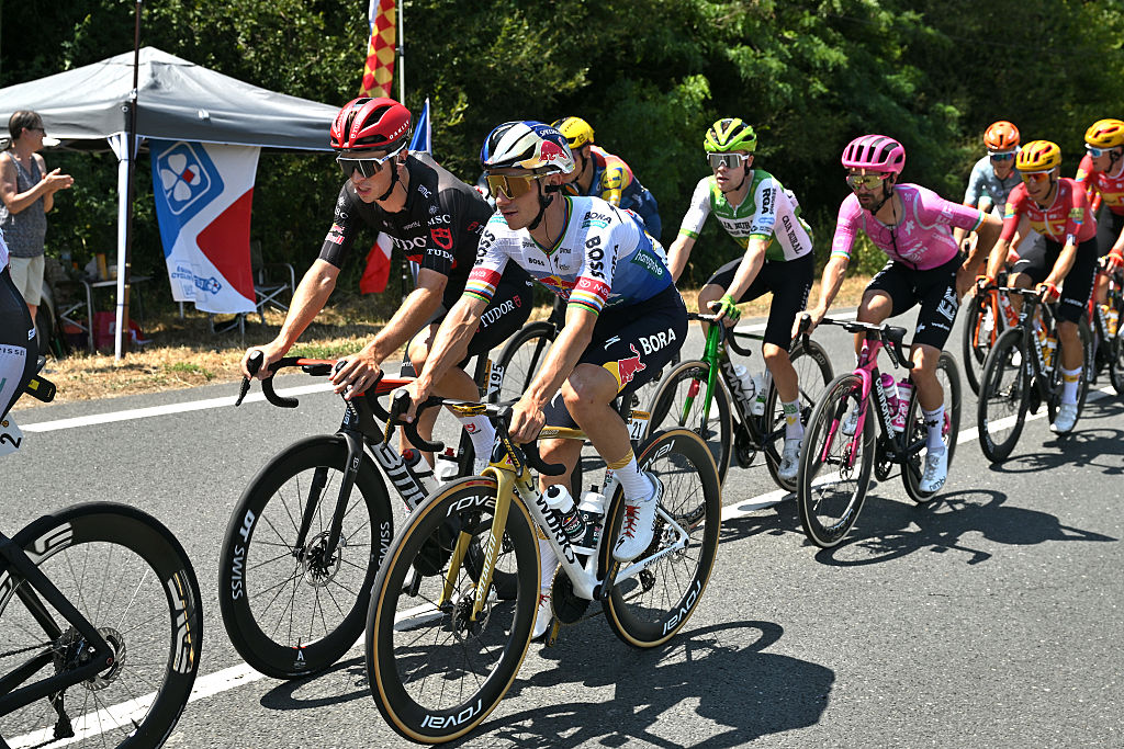 BERGERAC, FRANCE - JULY 11: (L-R) Rick Pluimers of Netherlands and Team Tudor Pro Cycling and Remco Evenepoel of Belgium and Team Red Bull - BORA - hansgrohe compete during the 113th Tour de France 2026, Stage 8 a 180.4km stage from Perigueux to Bergerac / #UCIWT / on July 11, 2026 in Bergerac, France. (Photo by Dario Belingheri/Getty Images)