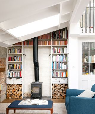 Book shelves with built in log storage and built around a log store