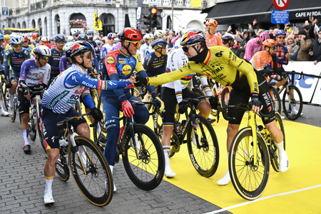 Remco Evenepoel and Wout van Aert shake hands on the start line of the 2026 Tour of Flanders