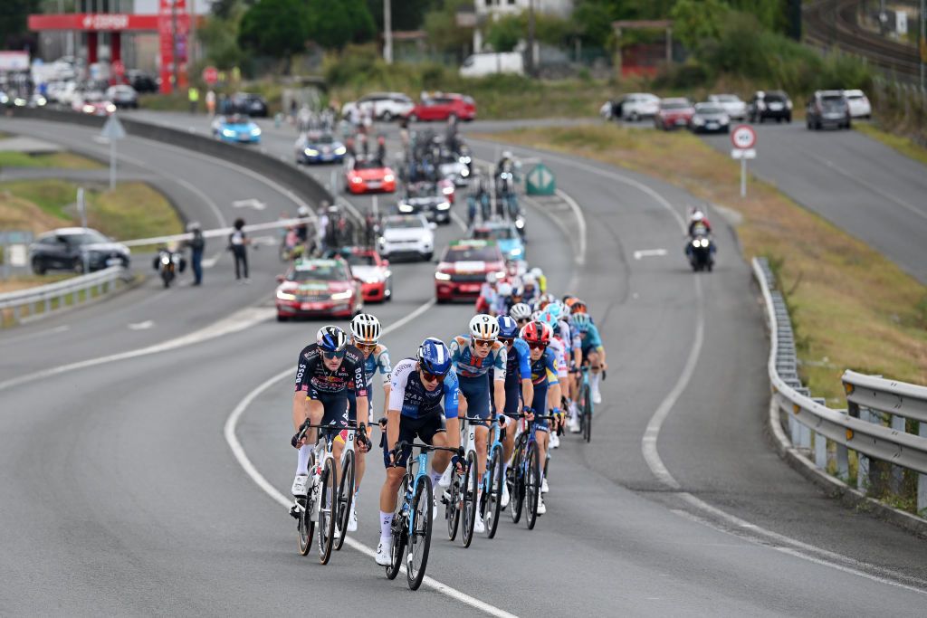 PADRON SPAIN AUGUST 28 LR Nico Denz of Germany and Team Red Bull Bora hansgrohe Corbin Strong of New Zealand and Team Israel Premier Tech and Gijs Leemreize of The Netherlands and Team dsmFirmenich PostNL compete in the breakaway during the La Vuelta 79th Tour of Spain 2024 Day 11 a 1665km stage from Padron to Padron UCIWT on August 28 2024 in Padron Spain Photo by Dario BelingheriGetty Images
