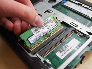 Slide the RAM out of its slot.