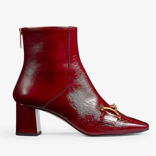 red leather boots with snaffle