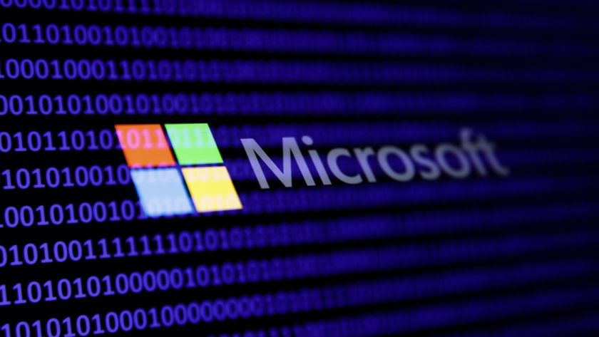 A binary code and Microsoft logo are seen in this multpiple exposure illustration photo.