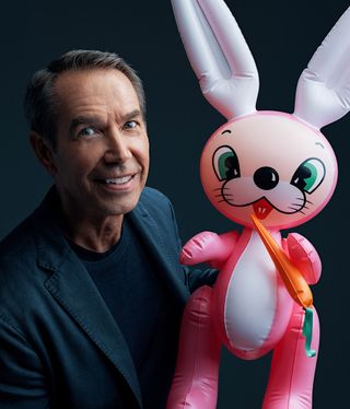 Portrait of Jeff Koons holding his inflatable Rabbit for MasterClass lesson