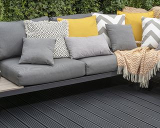 deck paintedblack with sofa and cushions