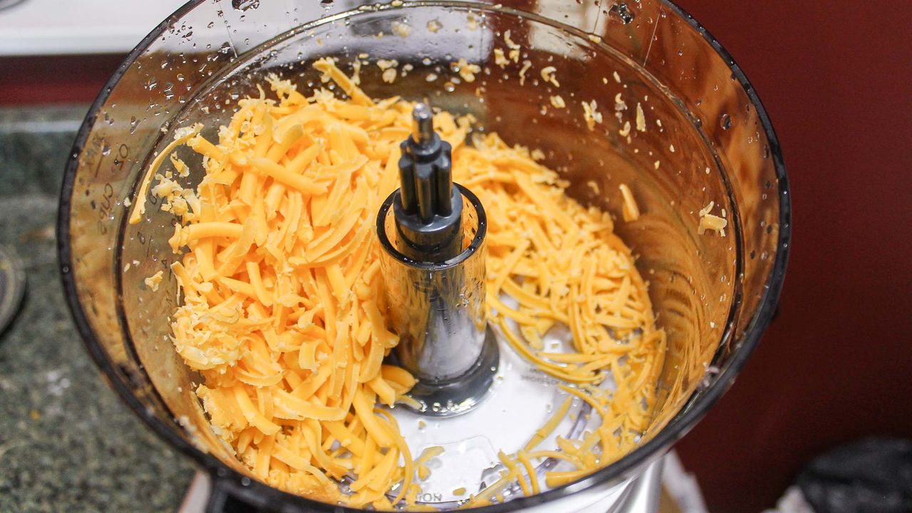 Cuisinart Elemental 8 Cup Food Processor processing cheese