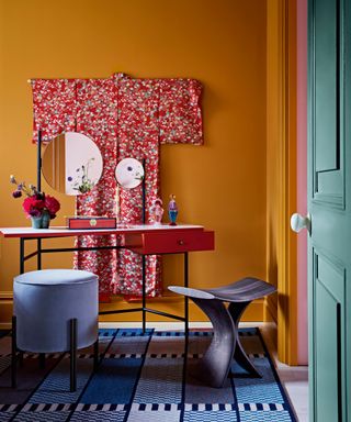 Home office with orange walls