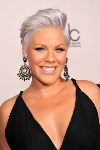 Pink is pictured with grey hair whilst arriving at the 2010 American Music Awards held at Nokia Theatre L.A. Live on November 21, 2010 in Los Angeles, California.