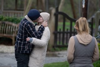 Mackenzie Boyd kisses Dawn.