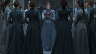 Aoife Hinds reads from a text while surrounded by fellow Sisters in Dune: Prophecy S1 E4 - "Twice Born."