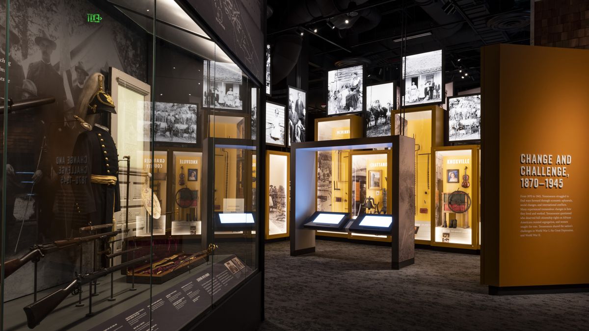 Visitors to the Tennessee State Museum explore artifacts and images with touchscreen displays.