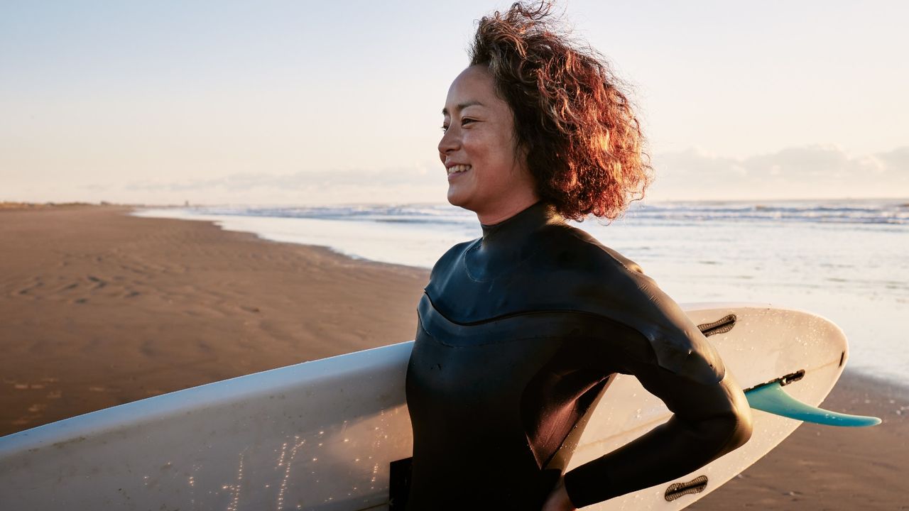 Woman with surf board