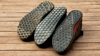 Three MTB shoe soles
