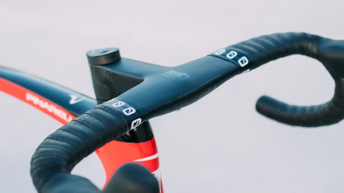 A red and black pinarello F road bike