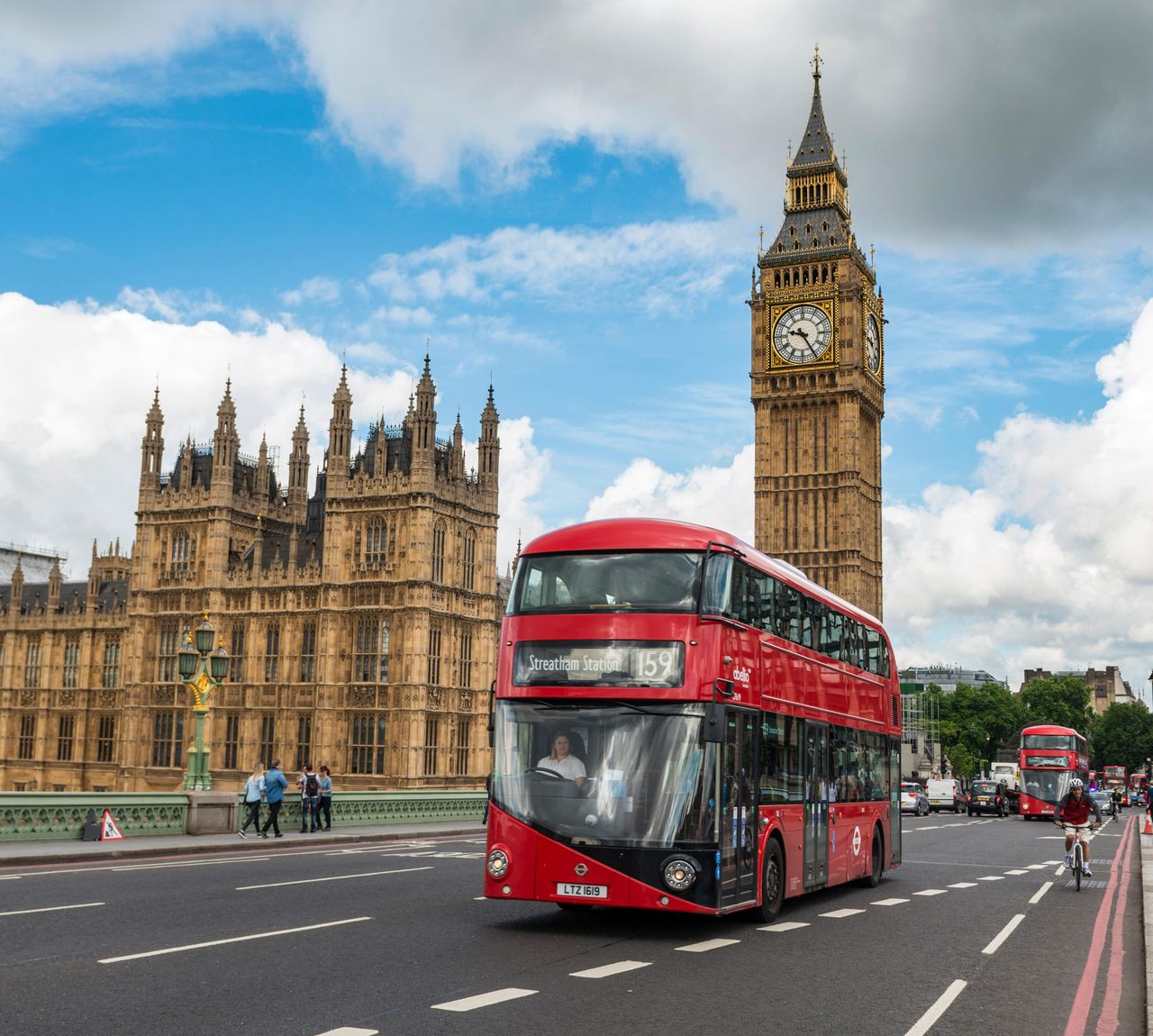 Red double-decker bus on the Westminster Bridge, Westminster Palace and Big Ben, London, England, Great Britain