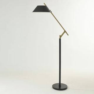 A black and gold floor lamp from Magnolia