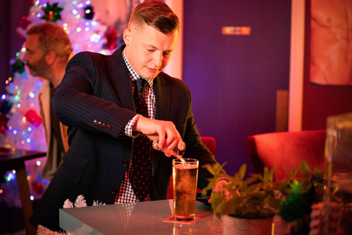 Aaron Monroe spikes a drink in EastEnders