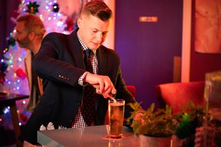 Aaron Monroe spikes a drink in EastEnders