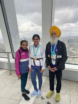 Min Kaur with her parents