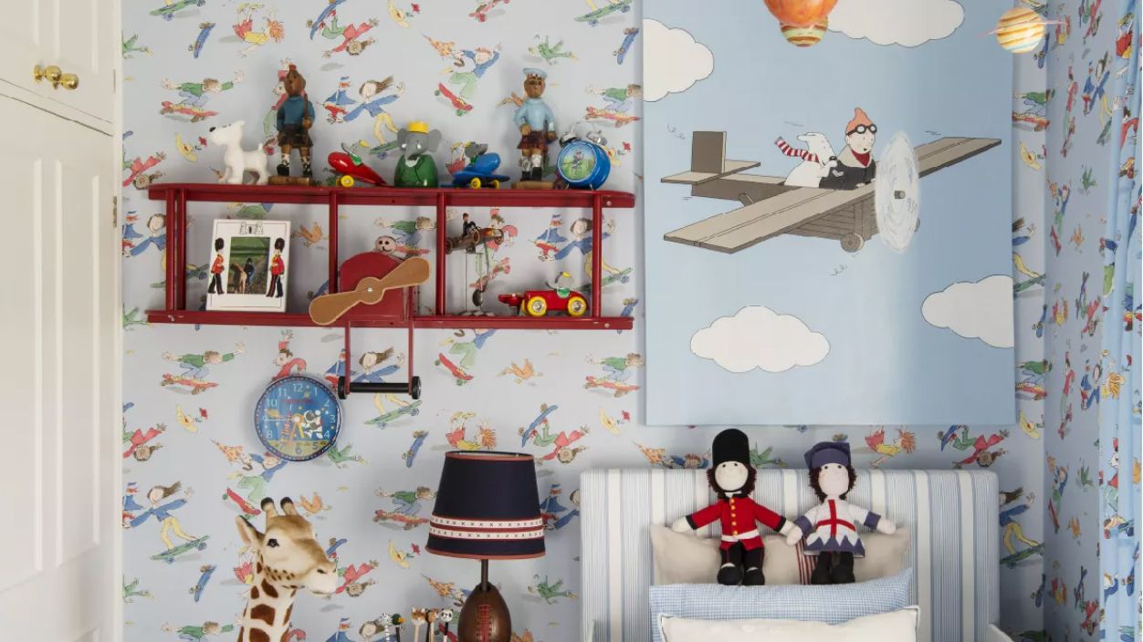 Boys bedroom with cloud wallpaper