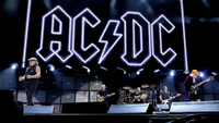 Brian Johnson, Stevie Young, Matt Laug, Chris Chaney, and Angus Young of AC/DC perform during their Power Up tour at MetLife Stadium on October 02, 2026 in East Rutherford, New Jersey. 