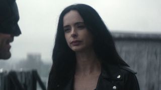 Jessica Jones looking mad while speaking to Daredevil on a roof in Born Again.