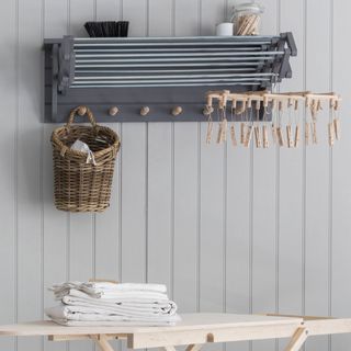 utility room with extending drying rack