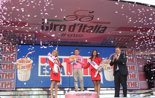 Taylor Phinney's pink jersey was symbolically presented while his injury was being assessed in an ambulance.