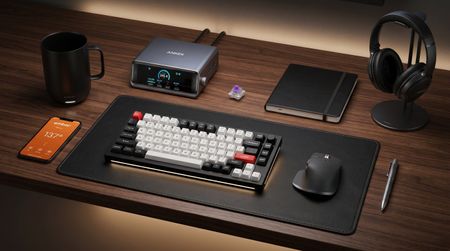 A selection of luxury home office essentials on a desk