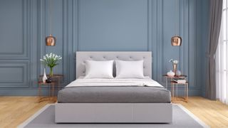 An ottoman bed in a paneled bedroom representing two of the top bedroom trends for 2022