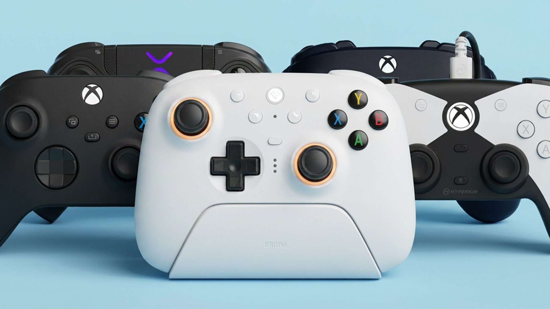 PC controllers on a sky blue backdrop