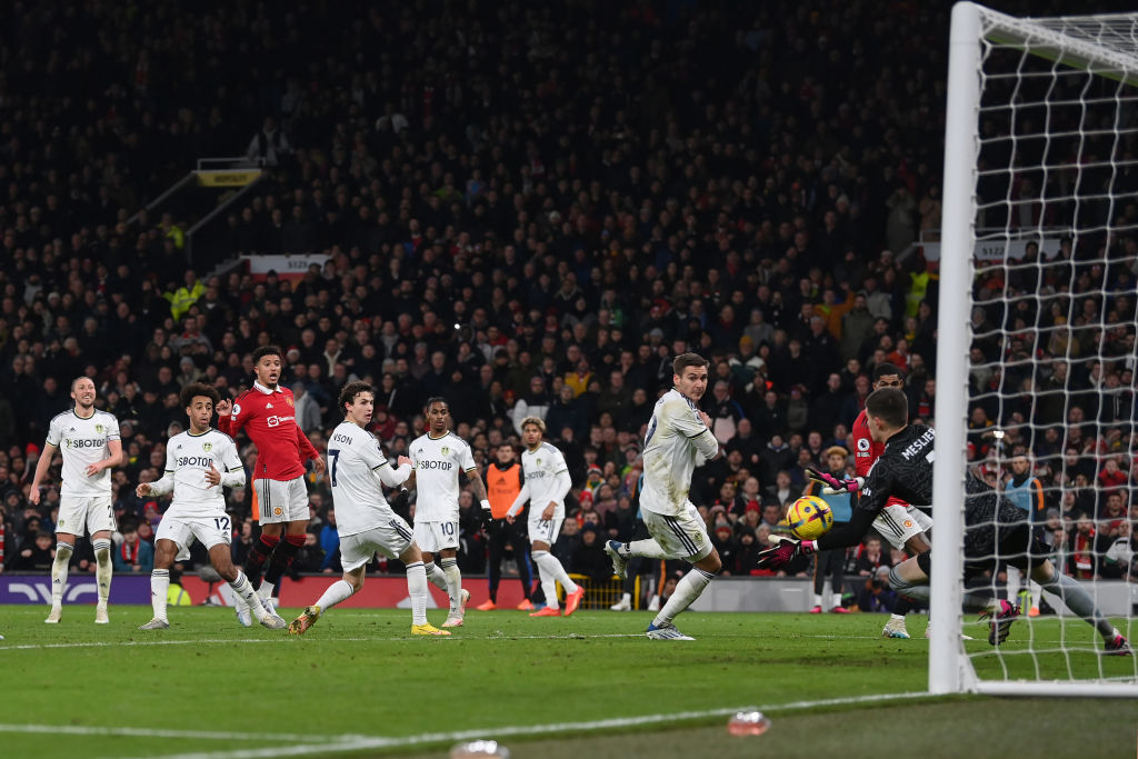 MANCHESTER, ENGLAND - FEBRUARY 08: Jadon Sancho of Manchester United scores to make it 2-2 during the Premier League match between Manchester United and Leeds United at Old Trafford on February 08, 2023 in Manchester, England. (Photo by Michael Regan/Getty Images)